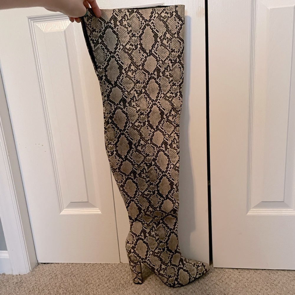 Snakeskin over the knee boots